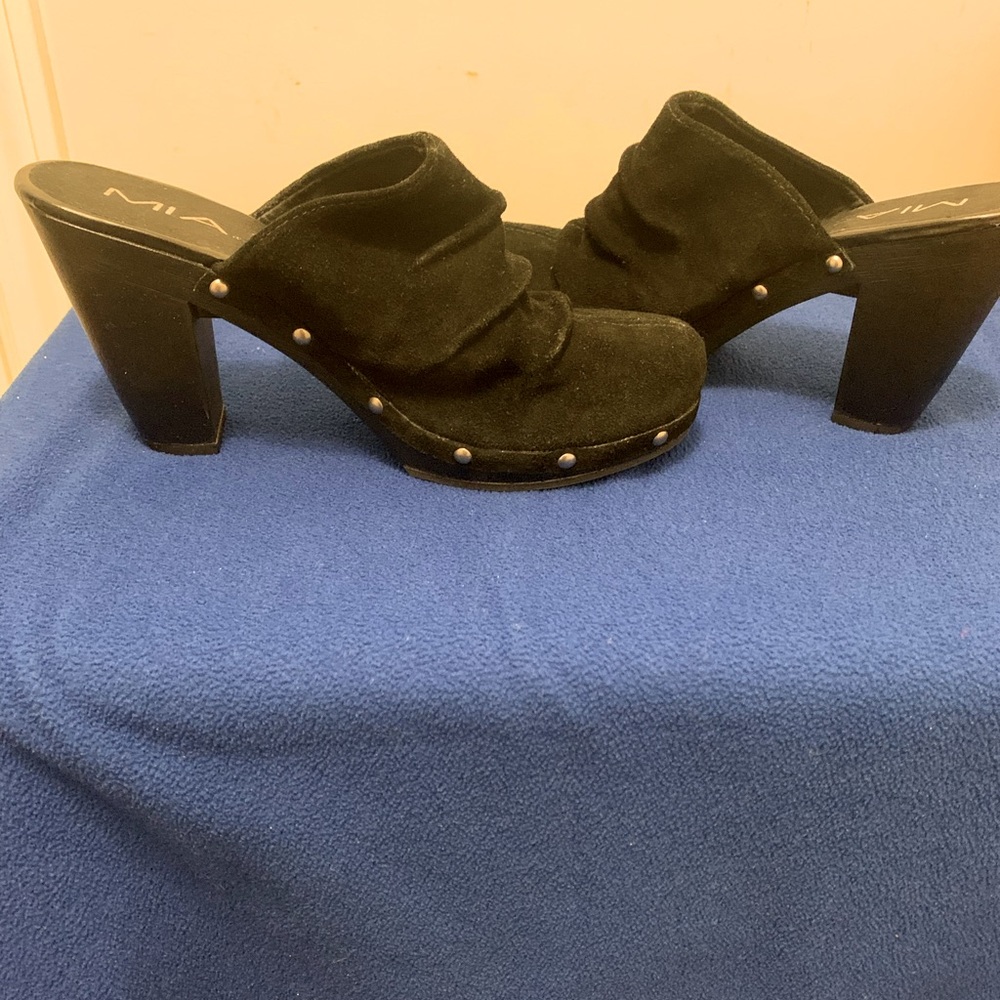Gently used. Clogs by MIA.